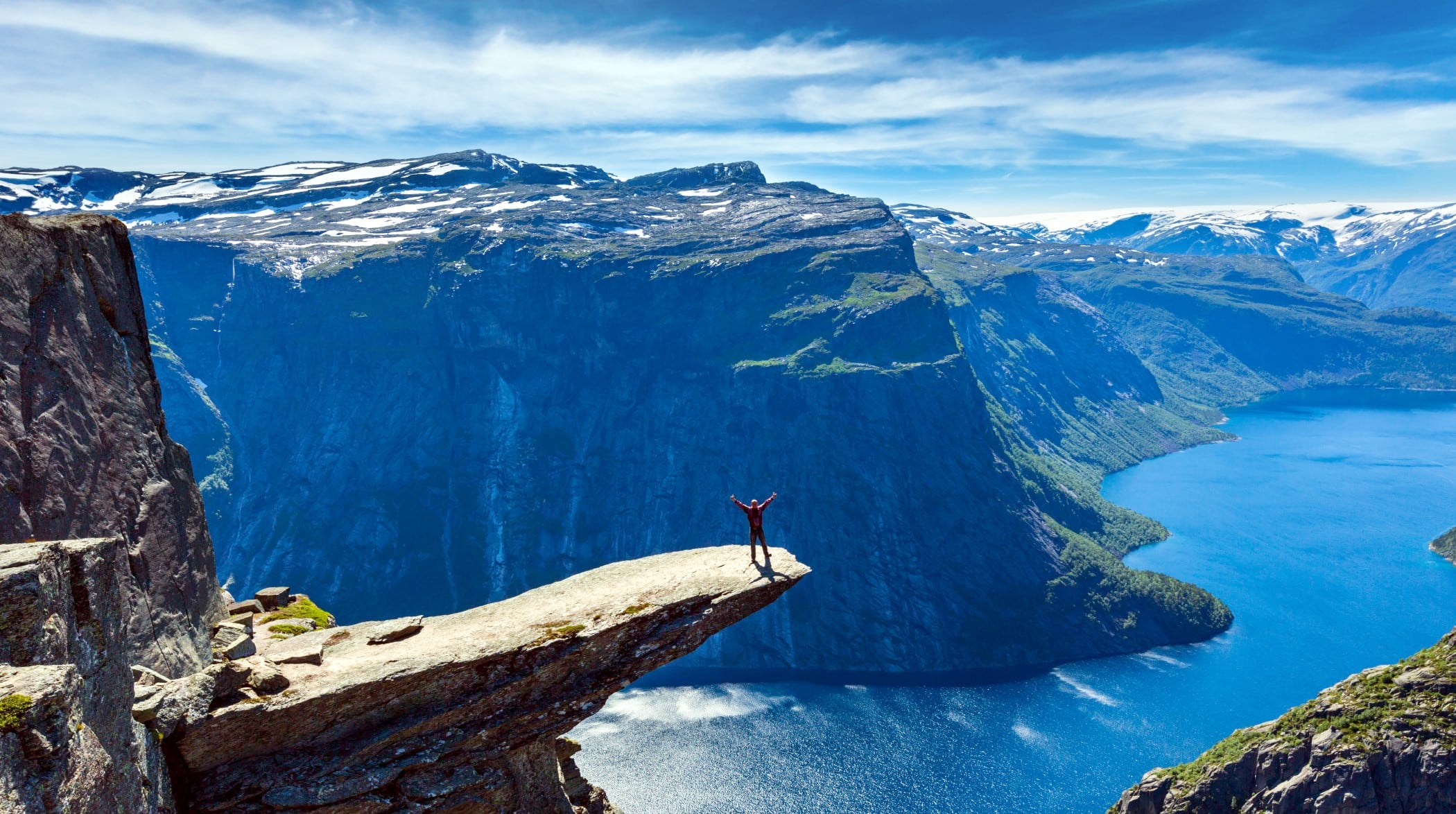 The summer sunshiny view of Trolltunga (famous The Troll's tongue Norvegian destination)